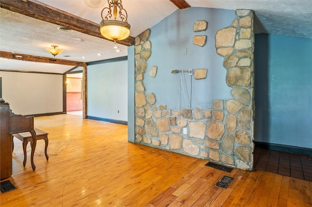 1369 Pittsford Mendon Rd, Mendon, NY 14506 - unfurnished dining area with wood-type flooring and baseboards