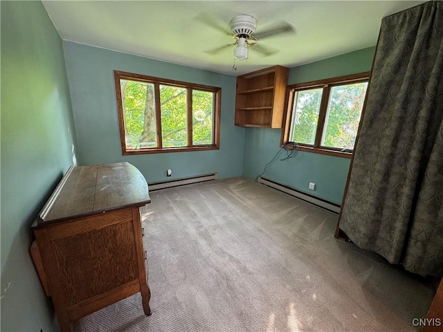 237 E Hamilton Ave, Sherrill, NY 13461 - unfurnished room featuring a baseboard radiator, a baseboard heating unit, a ceiling fan, and healthy amount of natural light
