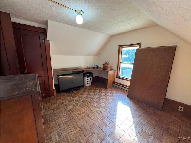 237 E Hamilton Ave, Sherrill, NY 13461 - bonus room with lofted ceiling, a textured ceiling, and a baseboard radiator