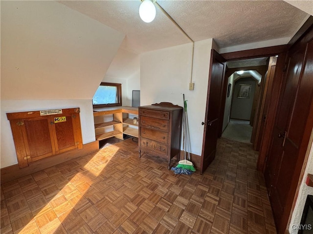237 E Hamilton Ave, Sherrill, NY 13461 - bonus room featuring a textured ceiling, arched walkways, and vaulted ceiling