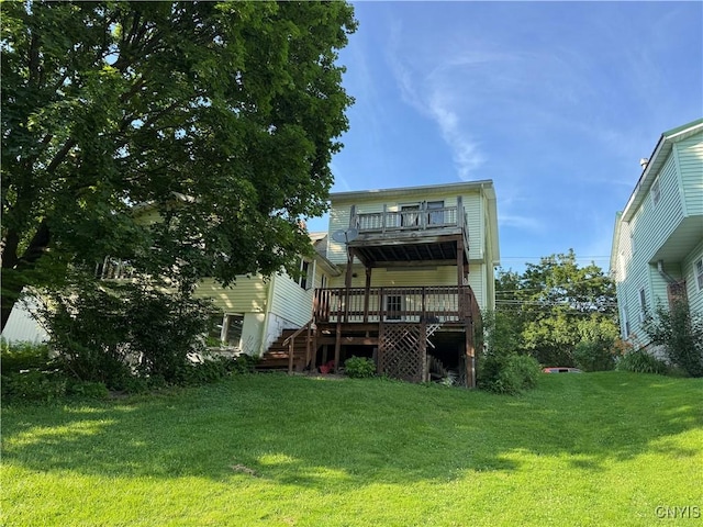 237 E Hamilton Ave, Sherrill, NY 13461 - rear view of house with a wooden deck, stairs, and a lawn