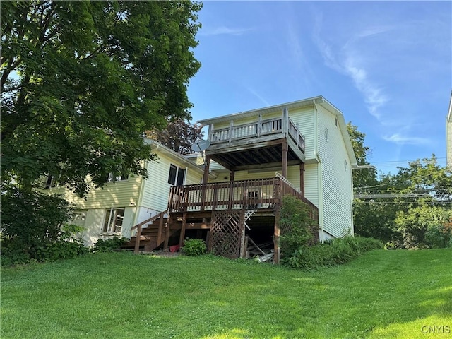 237 E Hamilton Ave, Sherrill, NY 13461 - rear view of house with stairs, a lawn, and a deck