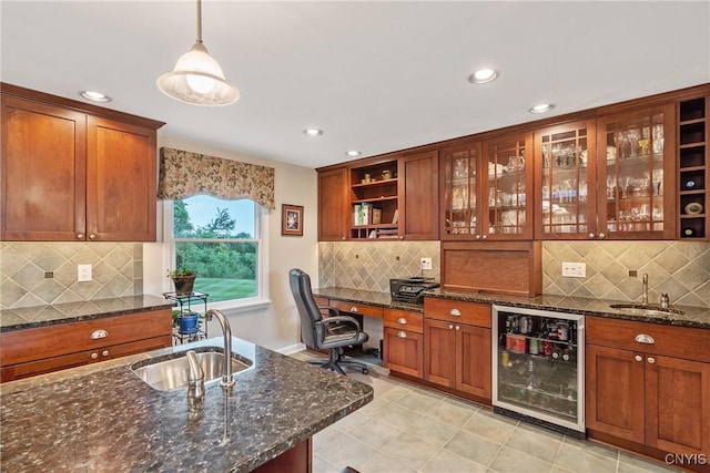 1705 Lancelot Pl, Skaneateles, NY 13152 - indoor wet bar with wine cooler, recessed lighting, decorative backsplash, pendant lighting, and light tile patterned floors