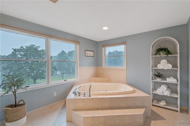 1705 Lancelot Pl, Skaneateles, NY 13152 - full bathroom featuring a jetted tub and tile patterned flooring