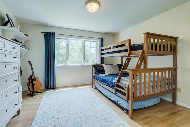 10 Muirfield Ct, Pittsford, NY 14534 - bedroom with light wood-style floors and baseboards