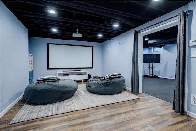 10 Muirfield Ct, Pittsford, NY 14534 - home theater room featuring baseboards and wood finished floors