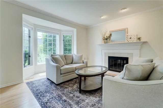 10 Muirfield Ct, Pittsford, NY 14534 - living area with wood finished floors, crown molding, a fireplace, and recessed lighting