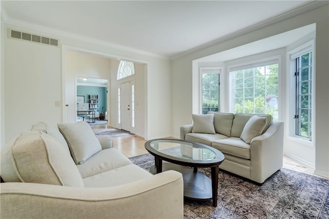 10 Muirfield Ct, Pittsford, NY 14534 - living area with wood finished floors and ornamental molding