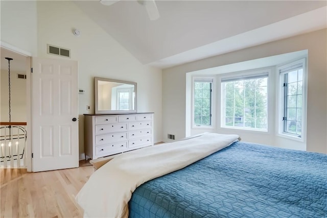 10 Muirfield Ct, Pittsford, NY 14534 - bedroom with light wood-style floors, high vaulted ceiling, and a ceiling fan