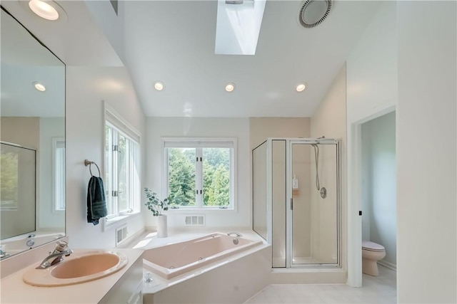 10 Muirfield Ct, Pittsford, NY 14534 - full bathroom featuring a garden tub, a stall shower, vanity, a skylight, and recessed lighting
