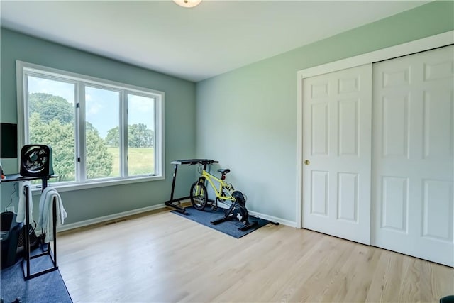 10 Muirfield Ct, Pittsford, NY 14534 - workout room featuring light wood-style floors and baseboards