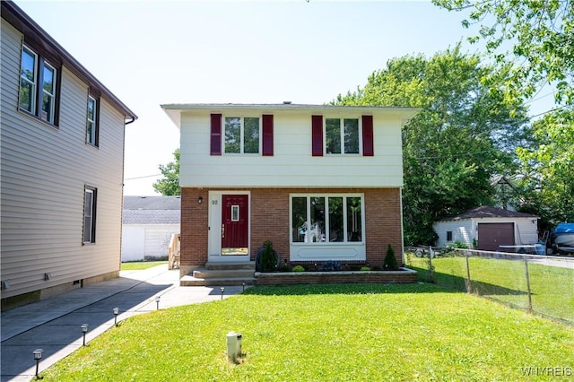 92 Schiller St, Buffalo, NY 14206 - view of front of house featuring brick siding and a detached garage