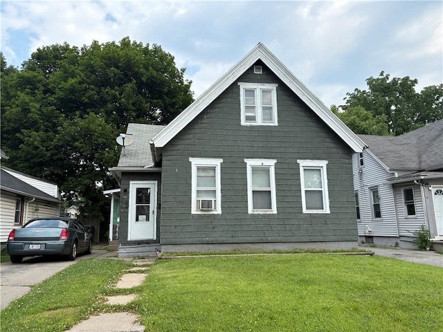 74 Ave D Ave, Rochester, NY 14621 - view of front facade with a front lawn