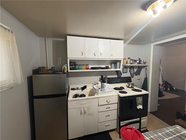74 Ave D Ave, Rochester, NY 14621 - kitchen featuring freestanding refrigerator, electric range oven, white cabinets, open shelves, and light tile patterned floors