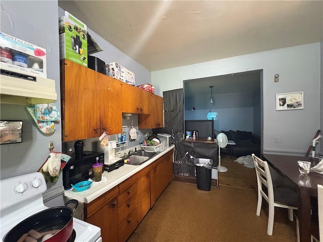 74 Ave D Ave, Rochester, NY 14621 - kitchen with brown cabinetry, electric stove, light countertops, and washer / clothes dryer