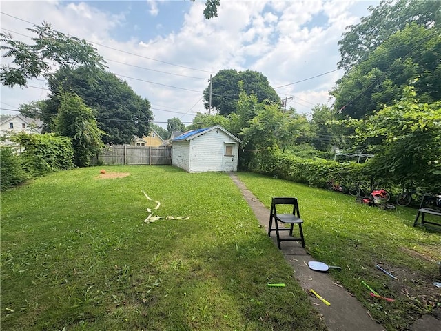 74 Ave D Ave, Rochester, NY 14621 - fenced backyard with a storage unit