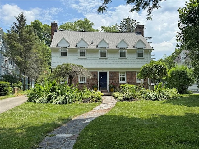 290 Hollywood Ave, Brighton, NY 14618 - view of front of home featuring a chimney and a front lawn