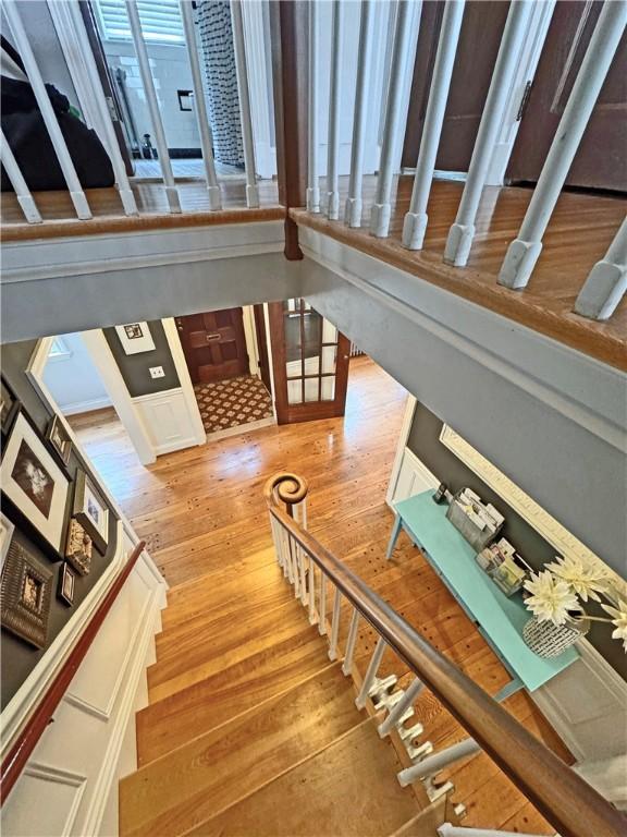 290 Hollywood Ave, Brighton, NY 14618 - stairway featuring hardwood / wood-style flooring