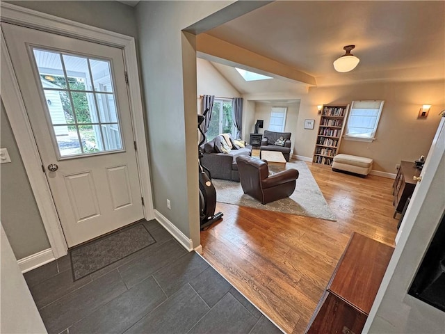 290 Hollywood Ave, Brighton, NY 14618 - entryway featuring a skylight, healthy amount of natural light, and dark tile patterned floors