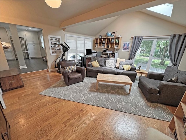 290 Hollywood Ave, Brighton, NY 14618 - living area with a skylight, lofted ceiling, and wood finished floors