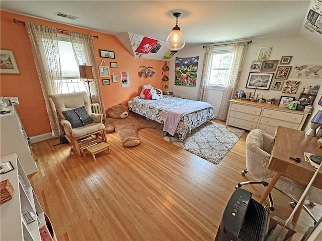 290 Hollywood Ave, Brighton, NY 14618 - bedroom featuring lofted ceiling and light wood finished floors