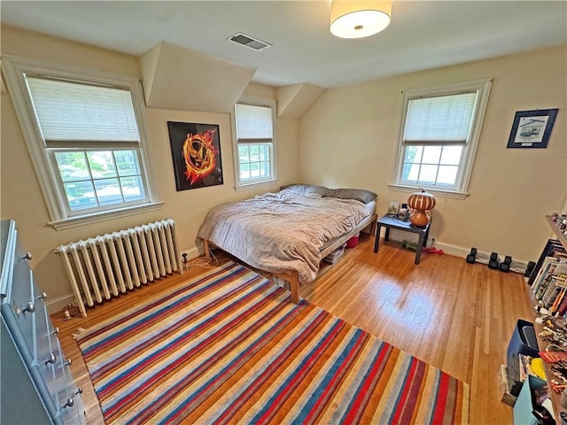 290 Hollywood Ave, Brighton, NY 14618 - bedroom with radiator and wood finished floors