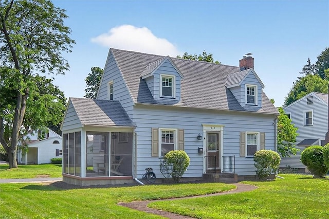 245 Worthington Rd, Irondequoit, NY 14622 - cape cod home featuring a sunroom, a chimney, and a front lawn