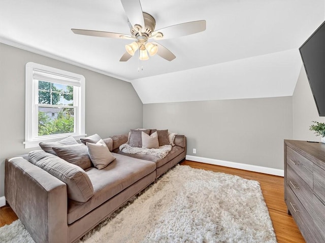 245 Worthington Rd, Irondequoit, NY 14622 - living room featuring a ceiling fan, vaulted ceiling, and light wood-type flooring