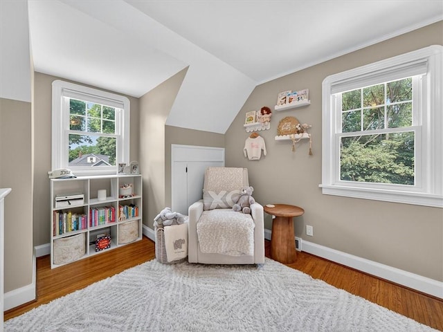 245 Worthington Rd, Irondequoit, NY 14622 - sitting room featuring wood finished floors and lofted ceiling