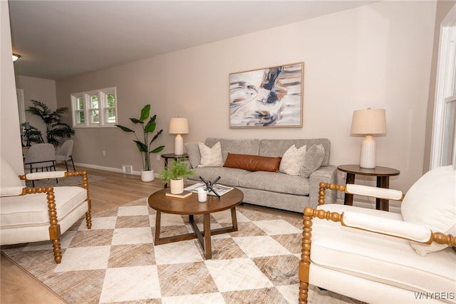 827 Tifft St, Buffalo, NY 14220 - living room featuring light wood-style flooring and baseboards