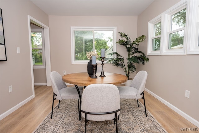 827 Tifft St, Buffalo, NY 14220 - dining space with light wood-style floors and healthy amount of natural light