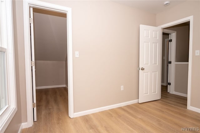 827 Tifft St, Buffalo, NY 14220 - unfurnished bedroom featuring light wood finished floors and baseboards