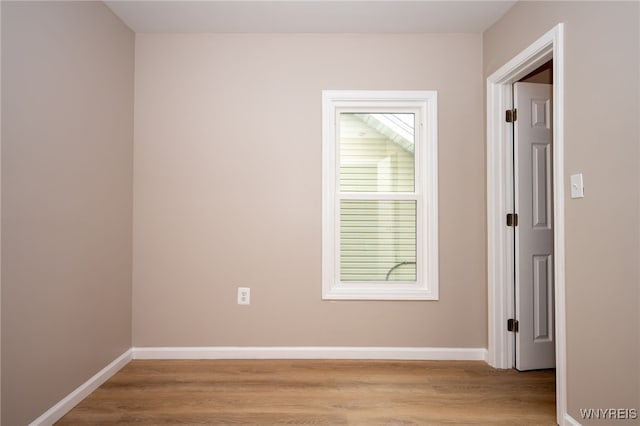827 Tifft St, Buffalo, NY 14220 - empty room featuring light wood finished floors and baseboards