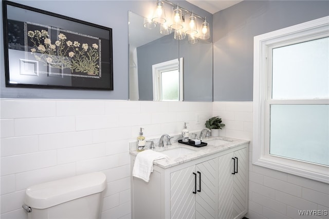 827 Tifft St, Buffalo, NY 14220 - bathroom with tile walls and double vanity