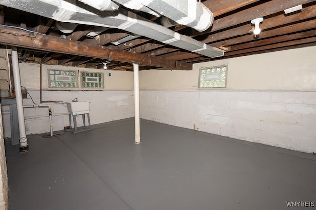 827 Tifft St, Buffalo, NY 14220 - basement with a sink and concrete block wall