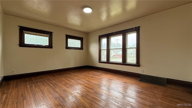 1890 Linwood Ave, Niagara Falls, NY 14305 - spare room with dark wood-style flooring and baseboards