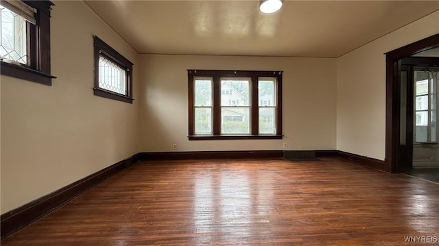 1890 Linwood Ave, Niagara Falls, NY 14305 - unfurnished room with plenty of natural light and dark wood-style flooring