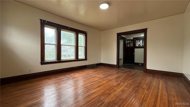 1890 Linwood Ave, Niagara Falls, NY 14305 - unfurnished room featuring dark wood-type flooring and baseboards