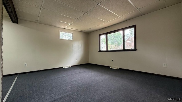 1890 Linwood Ave, Niagara Falls, NY 14305 - spare room featuring a drop ceiling and dark carpet