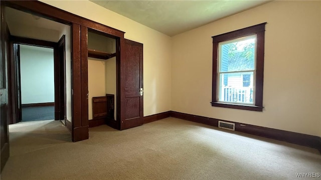 1890 Linwood Ave, Niagara Falls, NY 14305 - unfurnished bedroom with light carpet and baseboards
