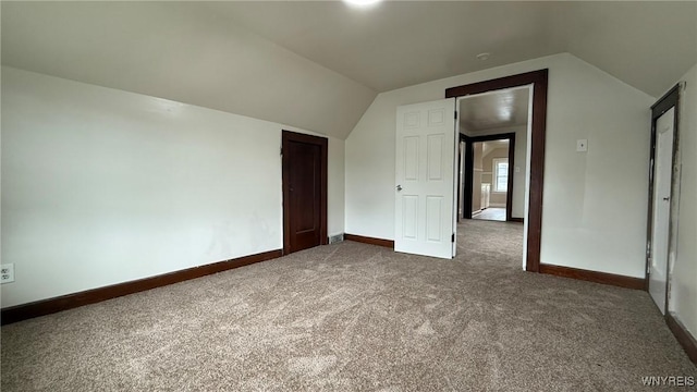 1890 Linwood Ave, Niagara Falls, NY 14305 - bonus room with dark colored carpet and lofted ceiling