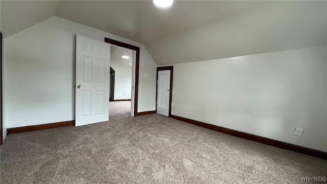 1890 Linwood Ave, Niagara Falls, NY 14305 - additional living space with carpet flooring and vaulted ceiling