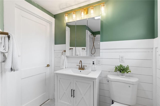 2079 Clifford Ave, Rochester, NY 14609 - full bathroom featuring vanity, a wainscoted wall, and a shower