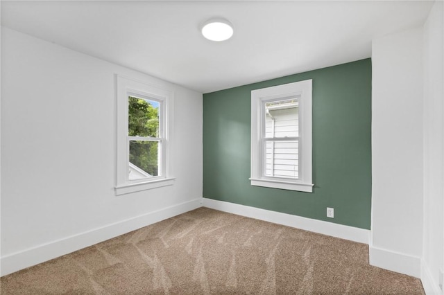 2079 Clifford Ave, Rochester, NY 14609 - unfurnished room with carpet and baseboards