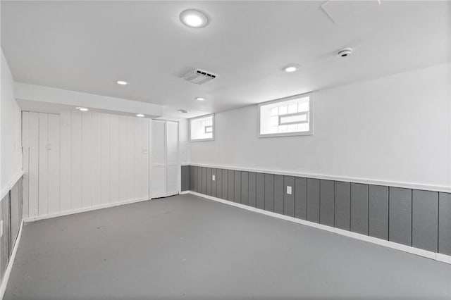 2079 Clifford Ave, Rochester, NY 14609 - basement with recessed lighting, wainscoting, and wooden walls