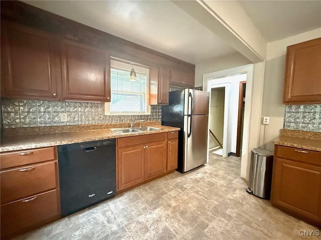 211 Pharis St, Syracuse, NY 13204 - kitchen featuring black dishwasher, freestanding refrigerator, backsplash, and brown cabinetry