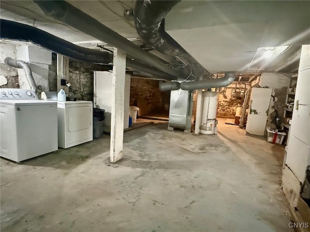 211 Pharis St, Syracuse, NY 13204 - unfinished below grade area featuring gas water heater and washer and clothes dryer
