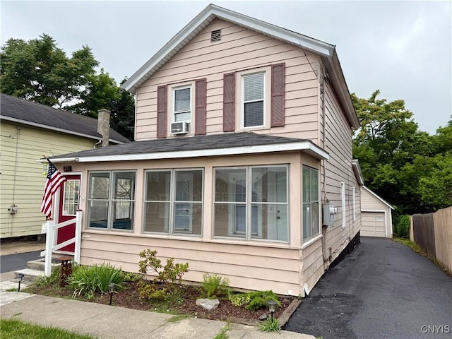211 Pharis St, Syracuse, NY 13204 - view of front of home with entry steps, an outdoor structure, and a detached garage
