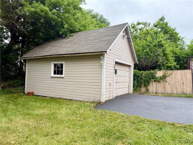 211 Pharis St, Syracuse, NY 13204 - detached garage featuring asphalt driveway