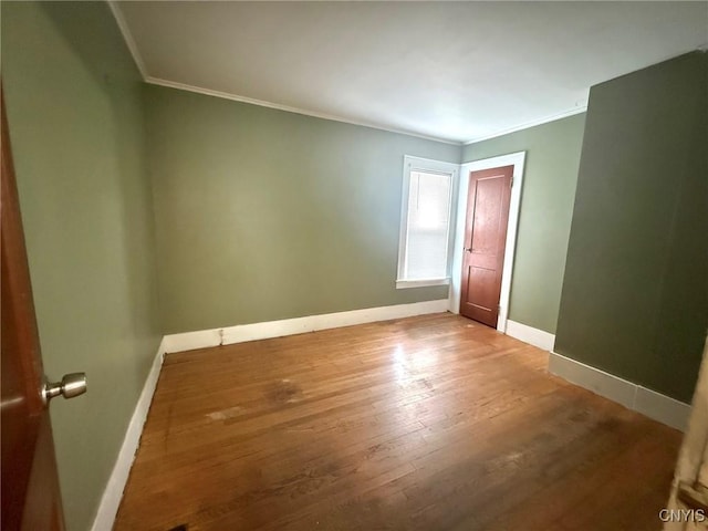 211 Pharis St, Syracuse, NY 13204 - unfurnished room featuring crown molding and wood finished floors